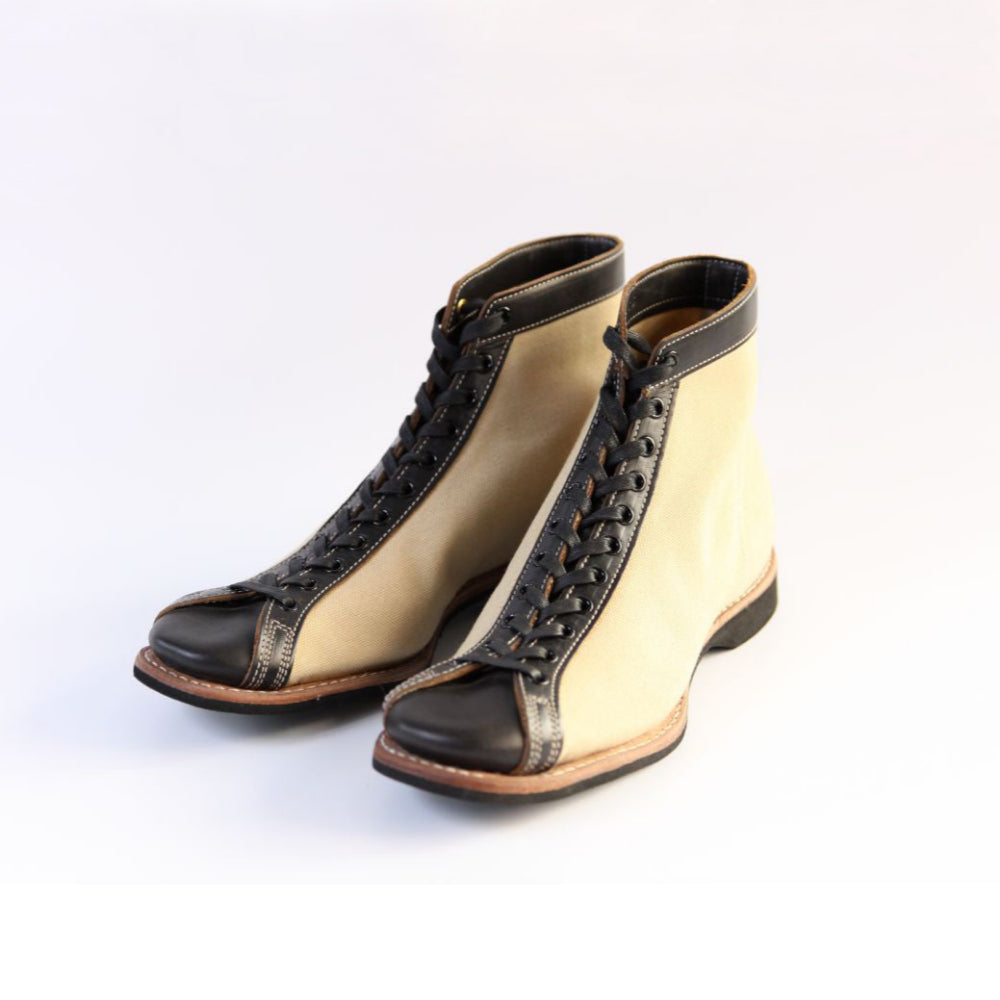 Mast Trainer Black × Ivory Canvas