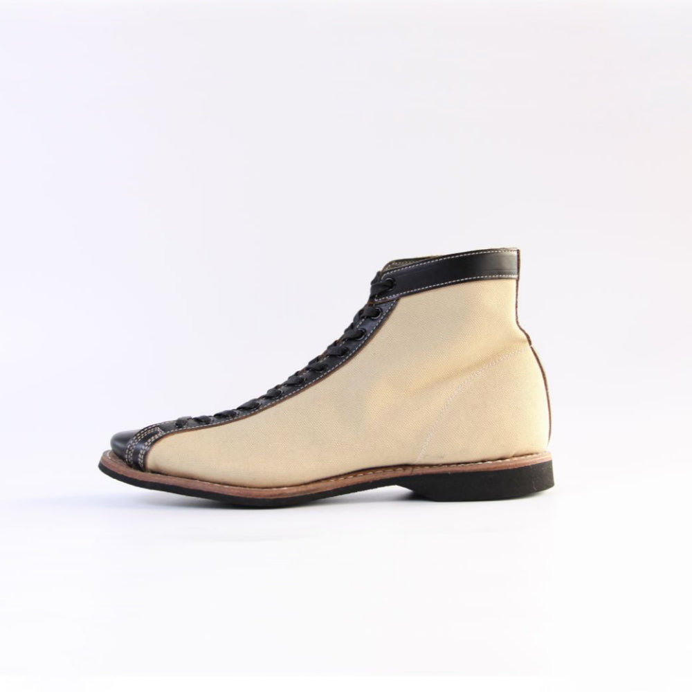 Mast Trainer Black × Ivory Canvas