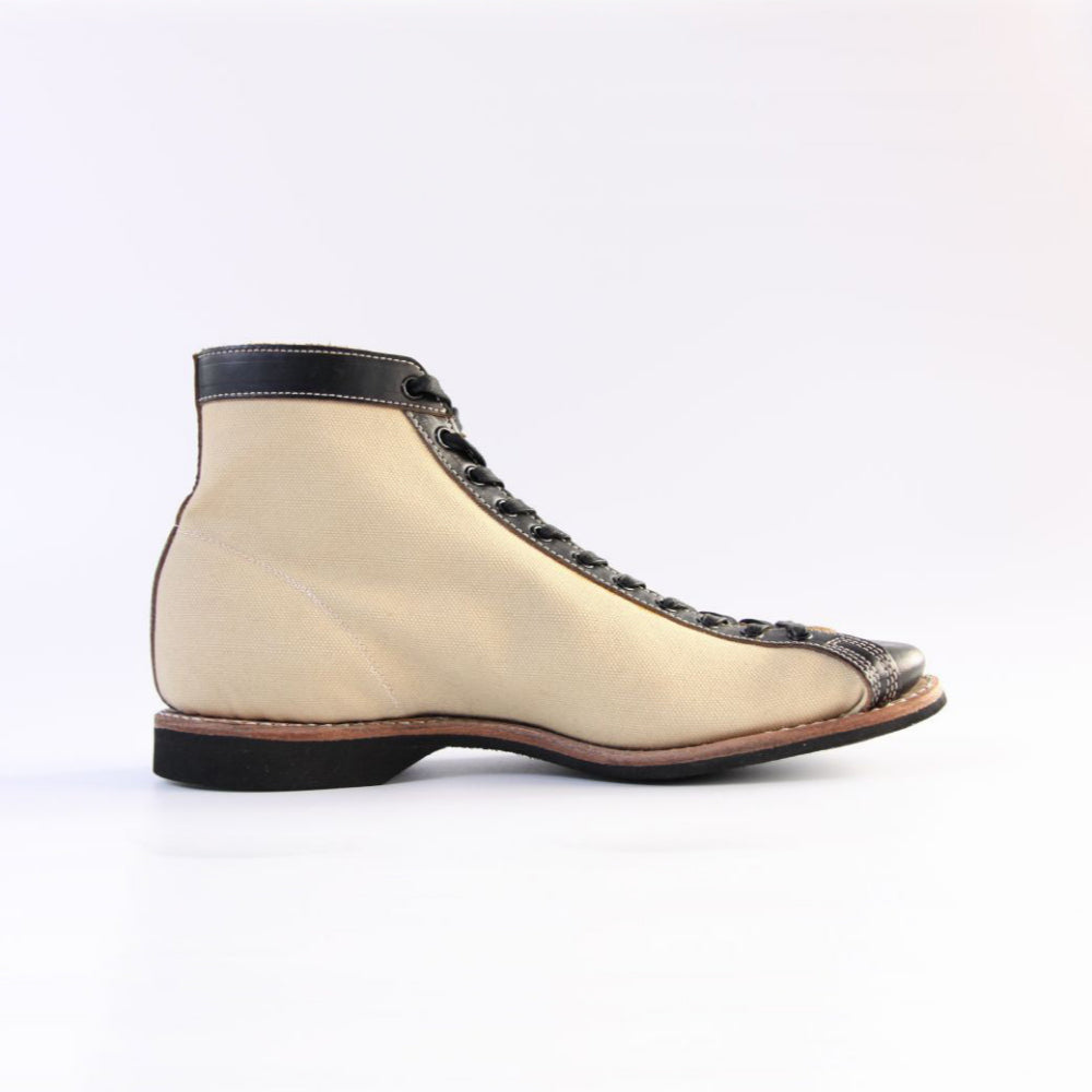 Mast Trainer Black × Ivory Canvas